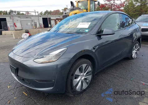 2023 Tesla Model Y Rwd из США, поврежденный, VIN 7SAYGDED6PF948385